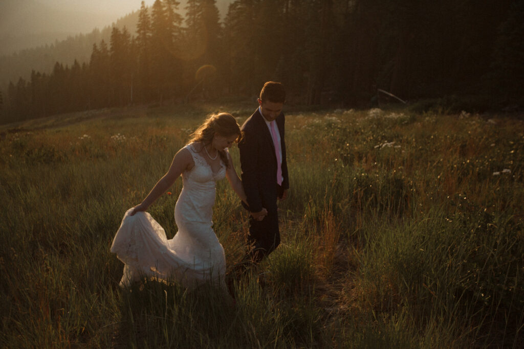 Wedding Photography, bride and groom walking during golden hour